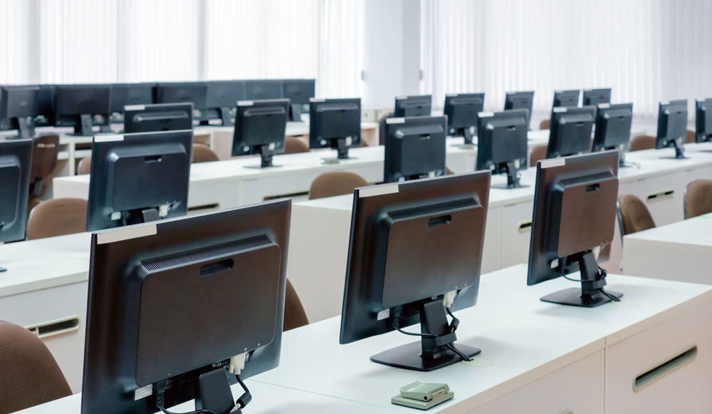 Illustration of a computer and fast internet connection symbols.